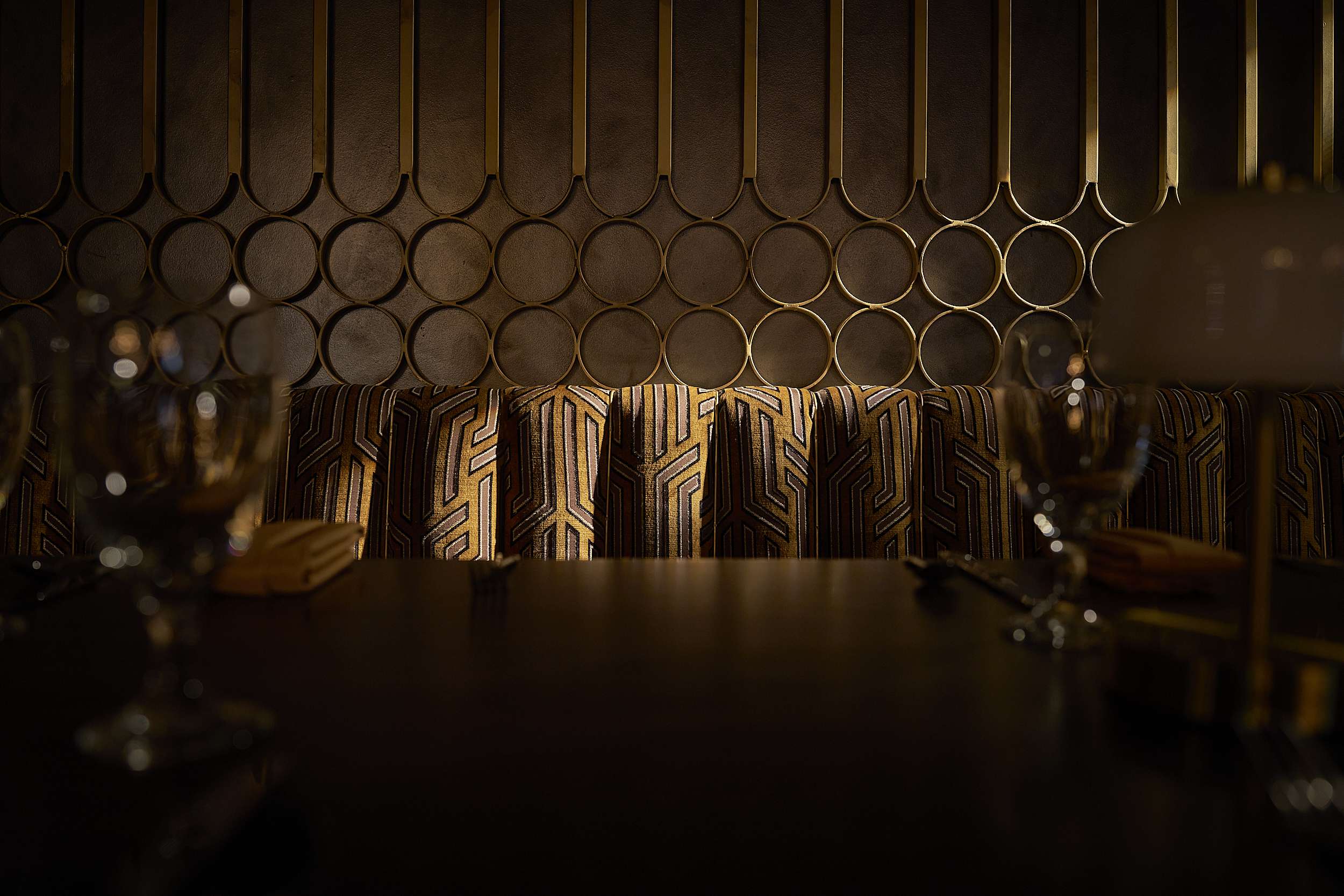 Cozy Dining Area at the Mayo Portrait’s 1925 Restaurant, Tulsa, with Art Deco Booth and a Set Table Ready for an Upscale Dinner. – Amatucci Photography - Amatucci Photography Cozy dining area at the mayo hotel restaurant tulsa with art deco booth and a set table ready for an upscale dinner amatucci photography